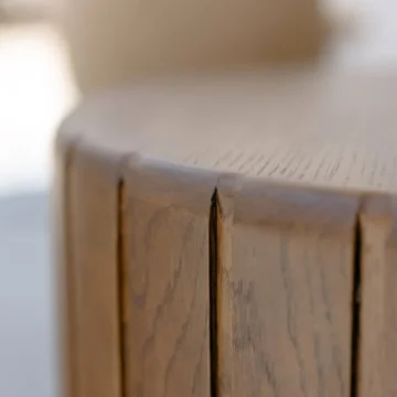 Detail of a wooden round table