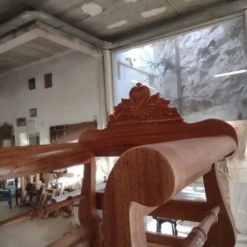 Engraved wooden chair under construction