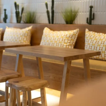 Wooden tables and chairs in a dining room